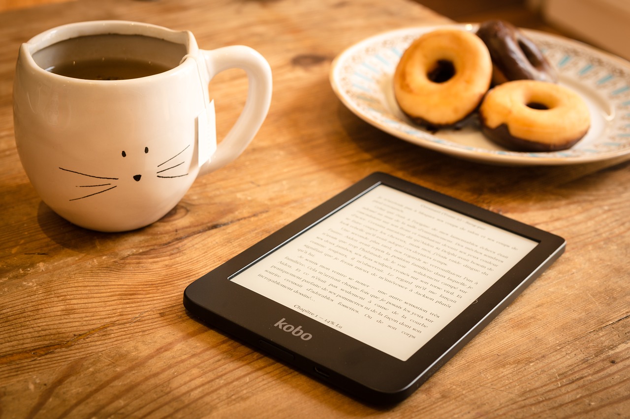 an e-reader on a breakfast table.