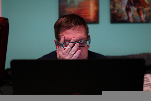 A burned-out author struggling to write using their computer